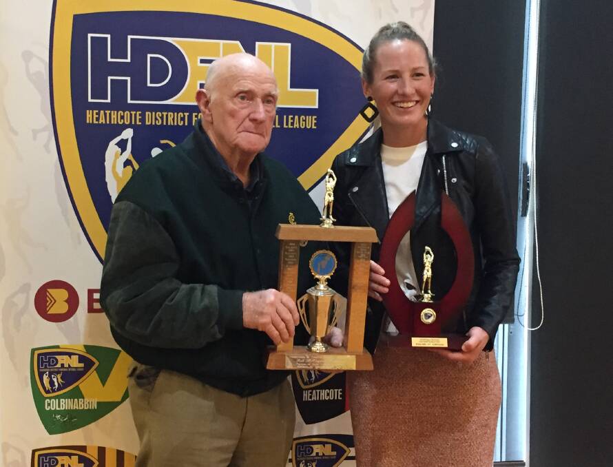 HDFNL life member Ron McTaggart with White Hills netball coach Lauren Bowles. White Hills won the Nell McTaggart Memorial Goal Throwing Trophy.