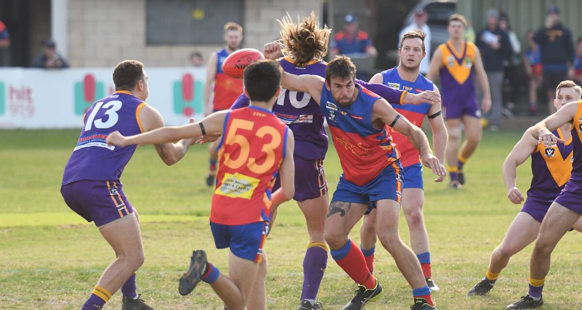 FIGHT FOR POSSESSION: Having lost its previous three games, Bears Lagoon-Serpentine scored an important 18-point win over Marong on Saturday. Picture: ANTHONY PINDA