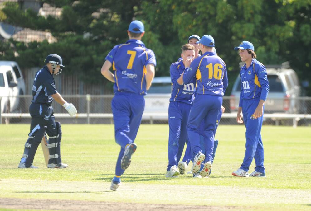 BULLDOGS BARK: Golden Square celebrates the wicket of Eaglehawk captain Cory Jacobs, who trudges off Wade Street after being bowled by Liam Smith for a duck on Saturday. Picture: ADAM BOURKE