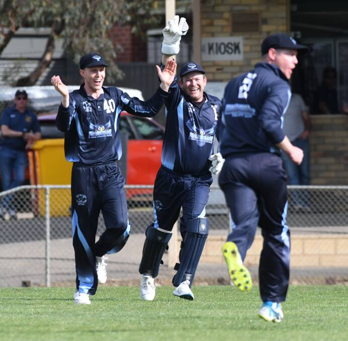 UP AND ABOUT: Eaglehawk celebrates a wicket in its round one win over Bendigo at Atkins Street. Picture: NONI HYETT