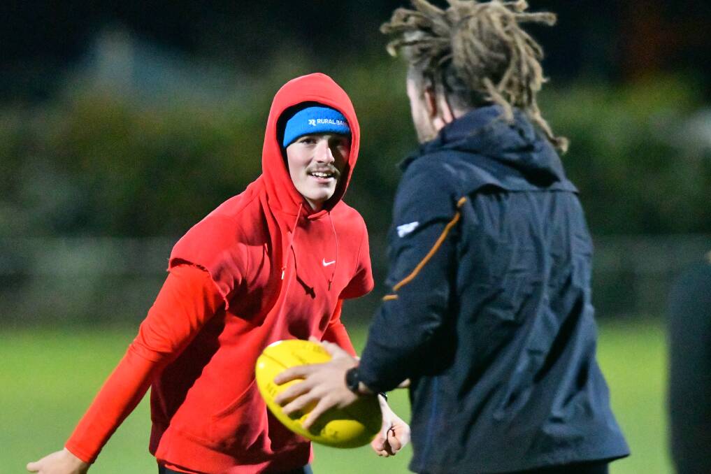 HARD YARDS: Zane Keighran and captain Jack Geary at Golden Square training this week. The Bulldogs would have played South Bendigo at the QEO on Saturday.