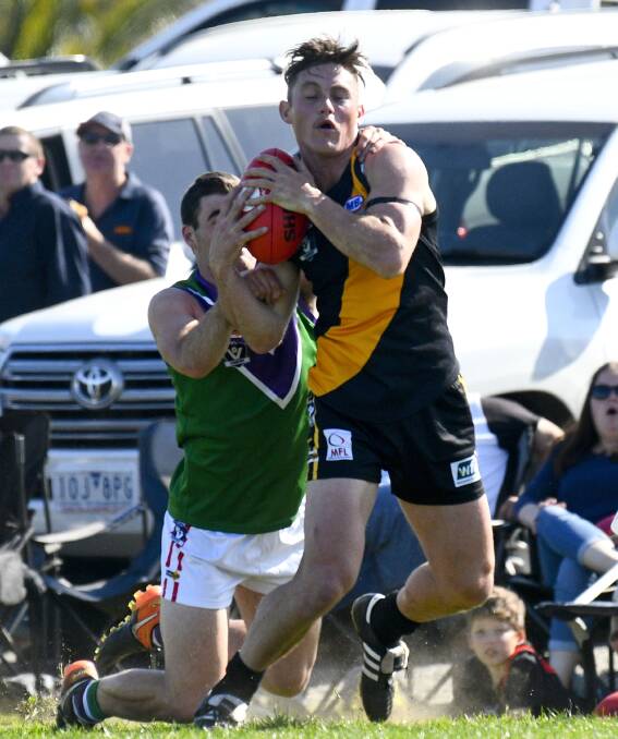 TOUGH TIGER: Sea Lake Nandaly midfielder Trent Donnan with possession in the grand final.