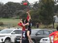 MARKING CONTEST: Marong forward Brandyn Grenfell and Inglewood defender Cody Stobaus compete in the first quarter on Saturday.