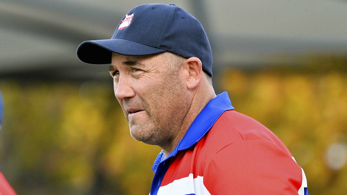 SITTING FOURTH: Gisborne coach Rob Waters. The Bulldogs have an 8-3 record and were supposed to play arch-rival Kyneton on Saturday.