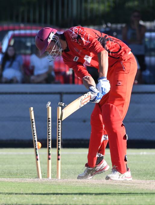 STUMPS RATTLED: Bendigo United opener Chris Howgate is bowled by White Hills' man of the match Rhys Irwin at the QEO. Picture: NONI HYETT