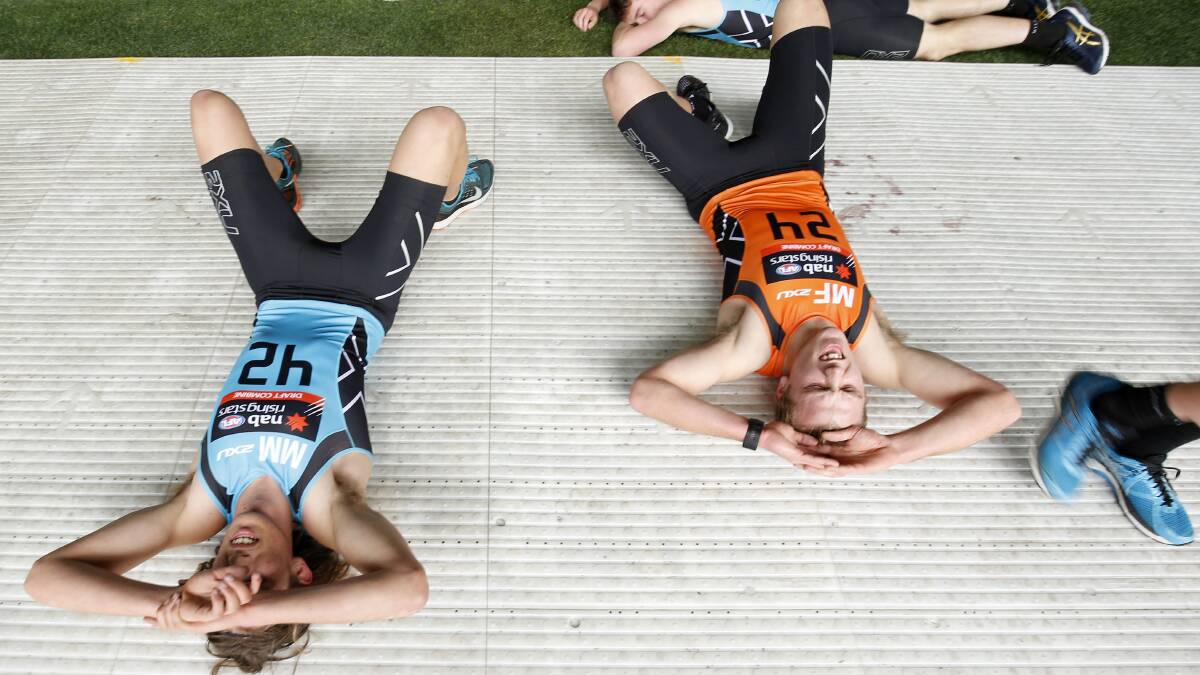 SPENT: Bendigo Pioneer Kobe Mutch and Joshua Begley recover after the 3km time trial during the AFL Draft Combine last Sunday. Picture: GETTY IMAGES