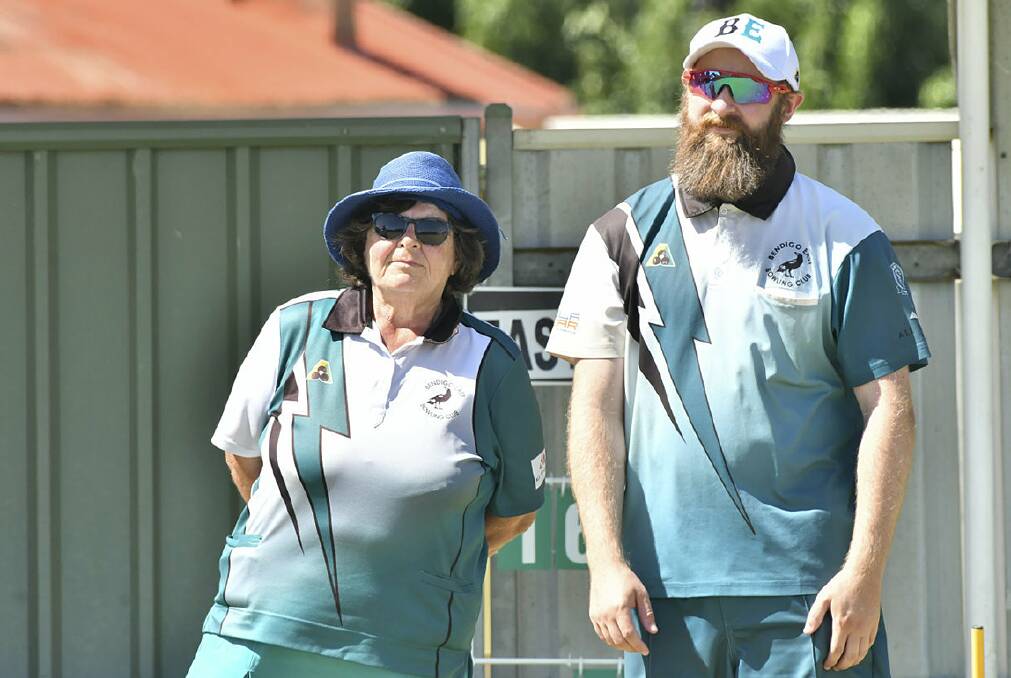 ON A ROLL: Joy Hoffman and Brendan Paley during Bendigo East's 33-shot win over White Hills on Monday. The Beasties have won four in a row and are third on the midweek pennant ladder. Picture: NONI HYETT