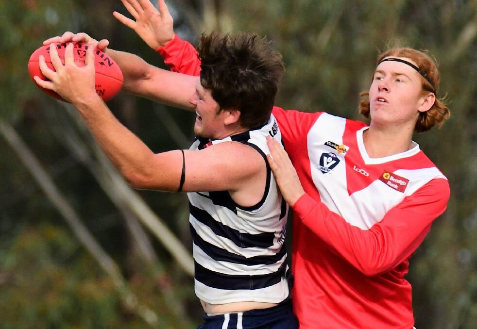 LEAGUE BEST AND FAIREST: Tyler Phillips flies for a mark against Elmore this year. Picture: RIVERINE HERALD