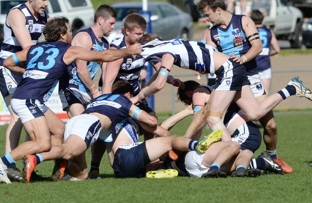 HEATED: Tempers flare during the first quarter of Saturday's clash between Strathfieldsaye and Eaglehawk. The Storm won by 77 points.