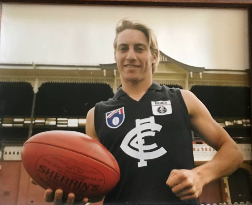 NEW BLUE: Damien Lock after being selected by Carlton with pick No.52 in the 1996 National Draft. This was the draft in which Michel Gardiner went No.1 to West Coast.