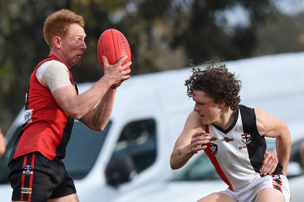 EYES ON THE BALL: White Hills' veteran Gavin Bowles during Saturday's seven-point win over Heathcote at Scott Street. The Demons are now well-positioned to finish fiffh on the ladder. Picture: DARREN HOWE