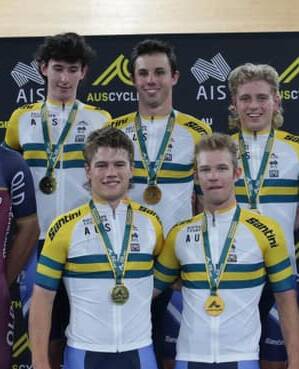 Pat Eddy (middle back) and his team-mates after winning the elite men team pursuit gold medal.