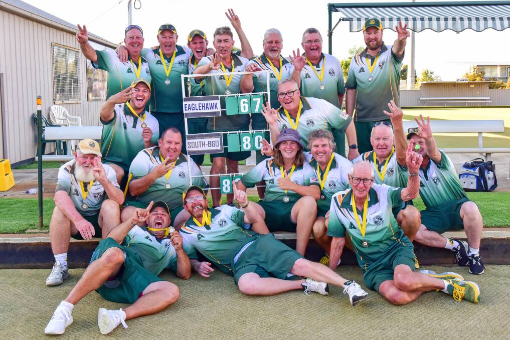 HAT-TRICK: South Bendigo players celebrate their grand final win over Eaglehawk at Bendigo East on Sunday. It was the Diggers' third flag in a row. Pictures: BRENDAN McCARTHY