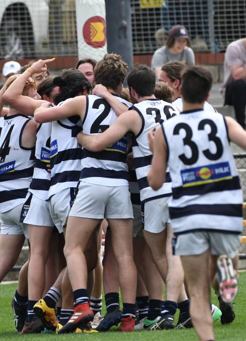 YOUNG GUNS: Strathfieldsaye's under-18s celebrate last year's premiership. The Storm are about to embark on a three-week break in the BFNL under-18 competition due to back-to-back byes and inter-league.