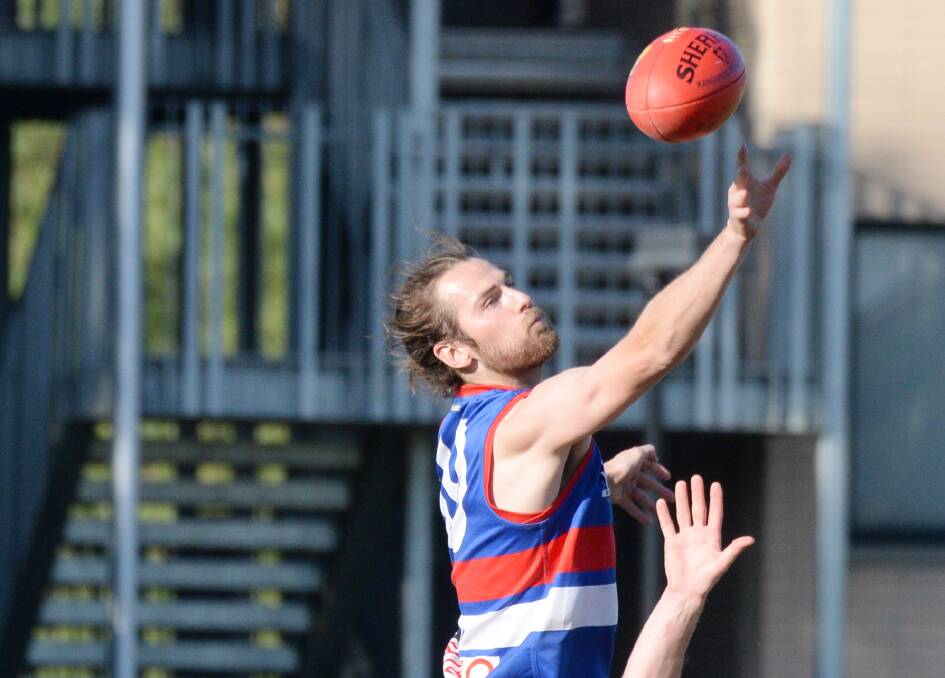 TALL TIMBER: The high-leaping Troy Kelm has been brilliant in the ruck in his return season to North Bendigo this year. Picture: DARREN HOWE