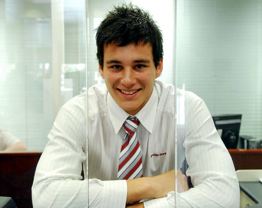 Robbie Tarrant working as a Bendigo Bank teller at the Strath Hill branch in 2007.