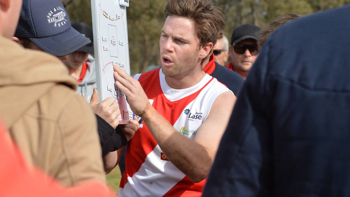 INSTRUCTIONS: Bridgewater coach Marc Lindsay addresses his players at quarter-time, at which stage the Mean Machine were nine points in front of Mitiamo.