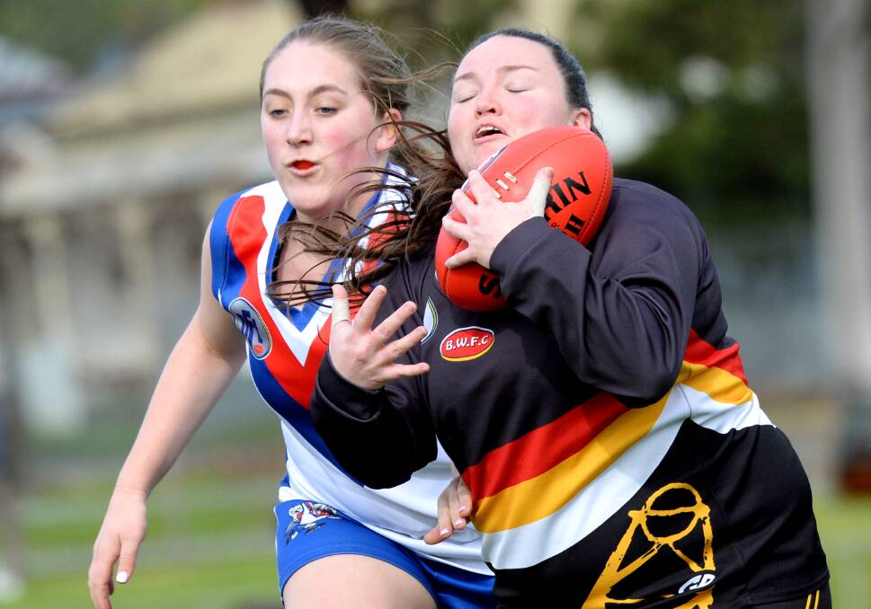 DETERMINED: Bendigo Thunder's Hannah Perry takes a mark during Sunday's six-point loss to West Preston-Lakeside at Weeroona Oval. Picture: DARREN HOWE