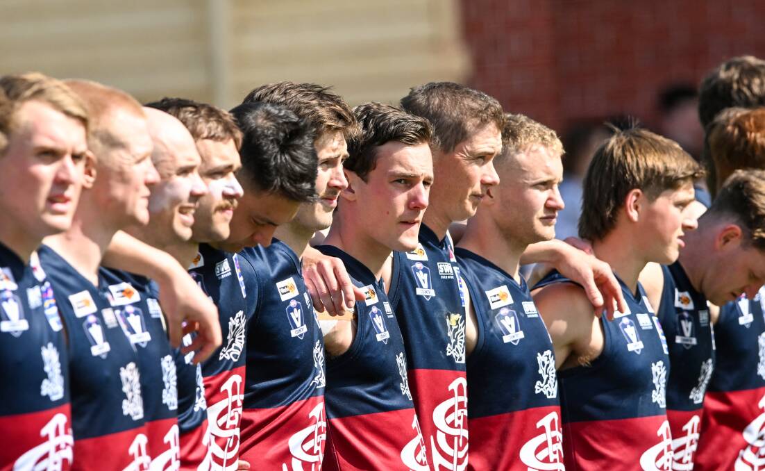 Sandhurst players during the pre-game national anthem before Saturday's grand final against Golden Square. Picture by Darren Howe