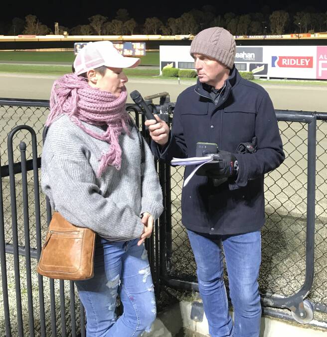 BIG NIGHT: Emma Stewart is interviewed by Paul Campbell after one of her seven winners at Bendigo on Tuesday night. Picture: BENDIGO HARNESS RACING CLUB