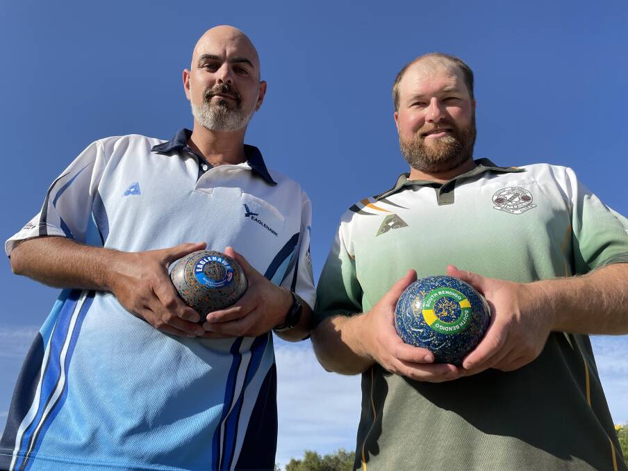 FLAG UP FOR GRABS: Eaglehawk skipper Dean Carter and South Bendigo coach Brad Holland ahead of Sunday's grand final. Picture: LUKE WEST