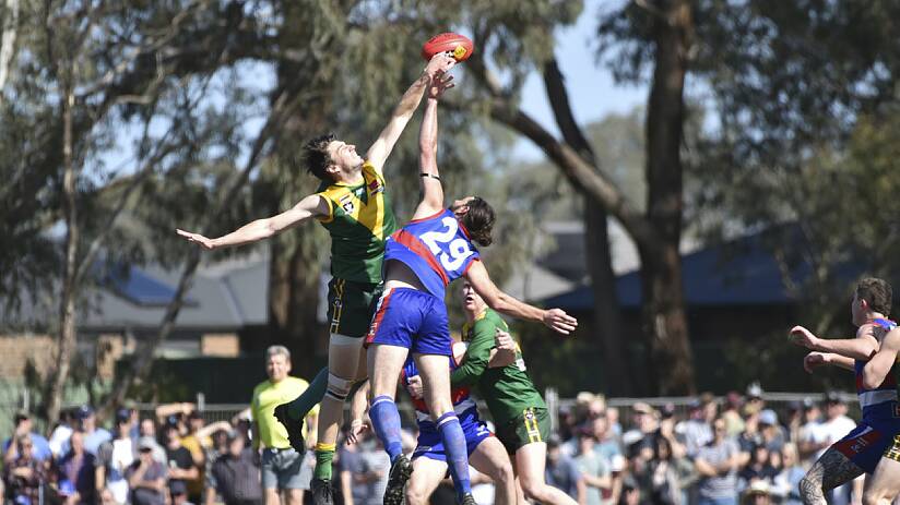 EYES ON THE PRIZE: Action from the 2019 HDFNL grand final between North Bendigo and Colbinabbin at Huntly. The Bulldogs won by 36 points.