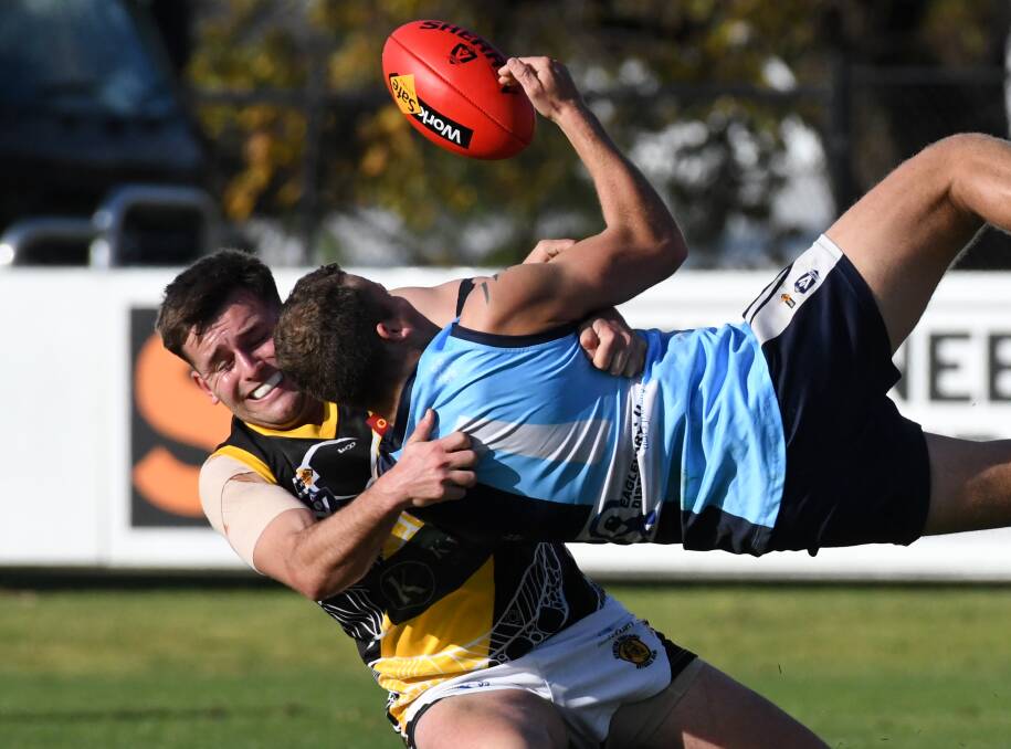 Newly-appointed Kyneton coach Ethan Foreman lays a tackle against Eaglehawk earlier this year. Picture by Noni Hyett