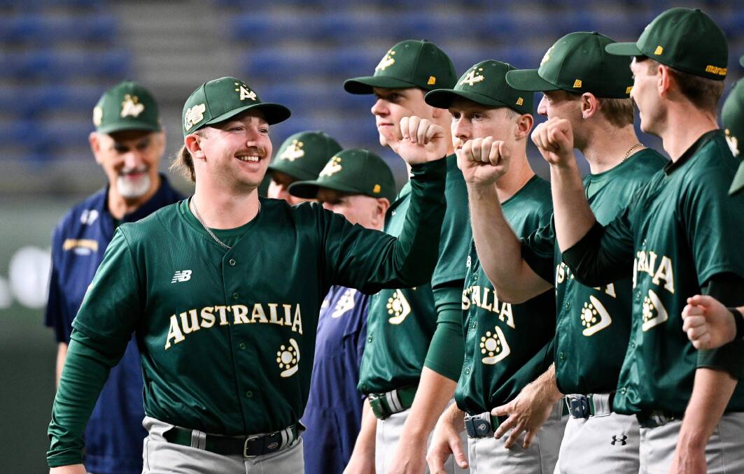 Billy Parsons is all smiles representing Australia at the Asia Professional Baseball Championship in Japan. Picture by Hiroki Chiba.