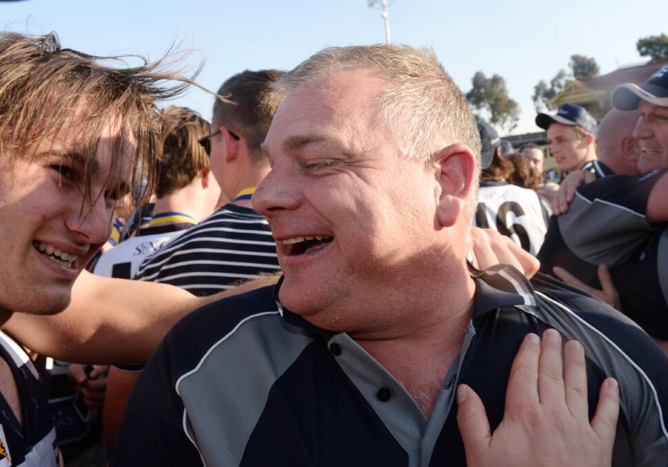 BOWING OUT ON A HIGH: Strathfieldsaye's Darryl Wilson ended his seven-year coaching tenure with a third premiership on Saturday after the Storm defeated Eaglehawk by 32 points at the QEO. Picture: DARREN HOWE