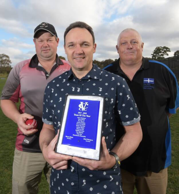 RECOGNITION: 2017-18 VCCL Team of the Year member Travis O'Connell with his plaque is flanked by West Bendigo coach Brendon Lummis and president Robbie Robertson. Picture: NONI HYETT