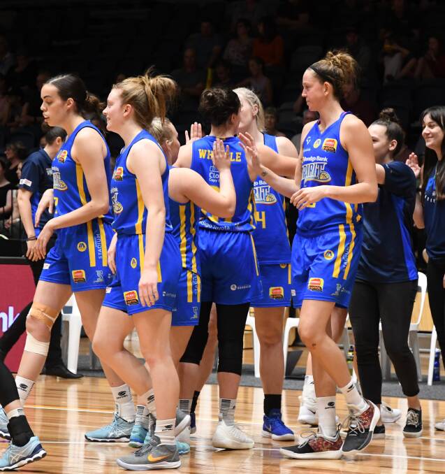 JOB WELL DONE: Bendigo Spirit players after Saturday night's win over Adelaide. The Spirit return to action on Monday night against Melbourne.