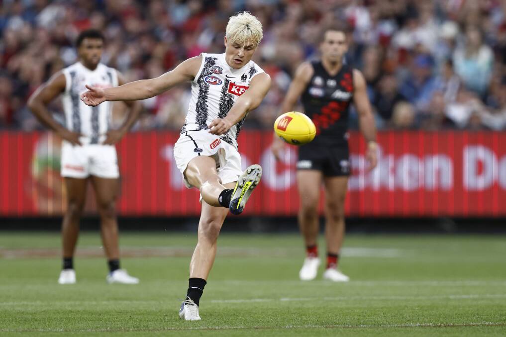SHARP-SHOOTER: Jack Ginnivan kicks one of his five goals for Collingwood against Essendon on Monday. Picture: GETTY IMAGES