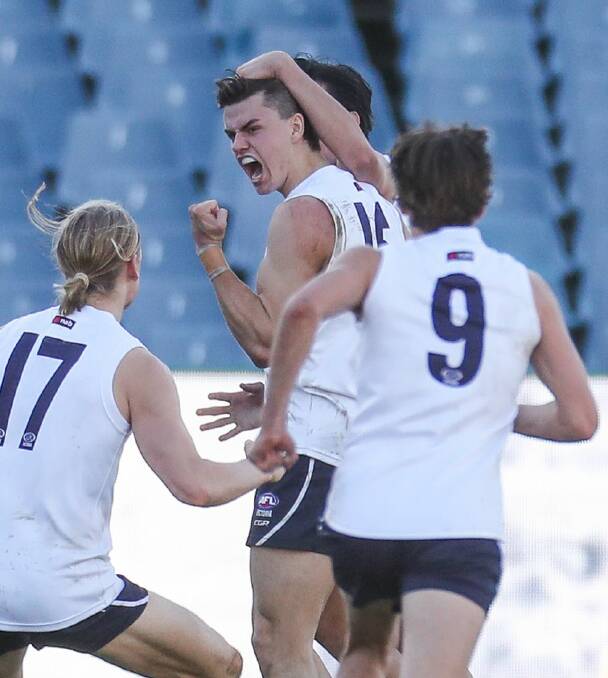 Bendigo Pioneers star Brodie Kemp celebrates his final minute goal to guide Victoria Country over the line against South Australia. Picture: MORGAN HANCOCK