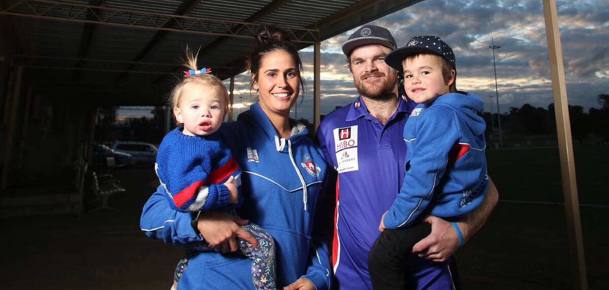 BULLDOG FAMILY: North Bendigo's Kristie and Ryan Alford with children Lola and Hudson this week. Both Kristie and Ryan will be part of Bulldogs' grand final teams on Saturday at Huntly. Picture: GLENN DANIELS