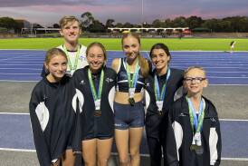 Kai Norton (back) with Imogen Brown, Grace Mulqueen, Kate Wilson, Mila Childs and Dylan Marron at the Australian Little Athletics Championships. Picture by Athletics Bendigo