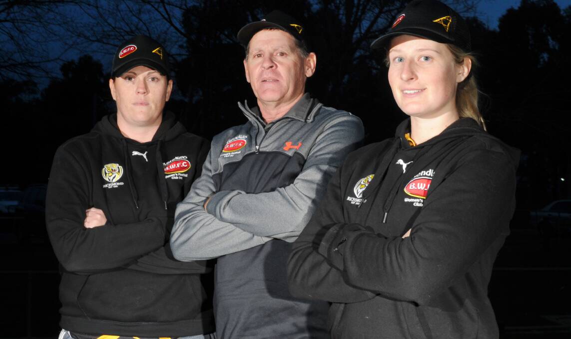 FIRED UP: Bendigo Thunder captain Erin Ross, coach Alan Last and vice-captain Emily Doran ahead of Sunday's inaugural Northern Country Women's League grand final. The Thunder take on Benalla Saints at Weeroona Oval from 2.30pm on Sunday. Picture: NONI HYETT