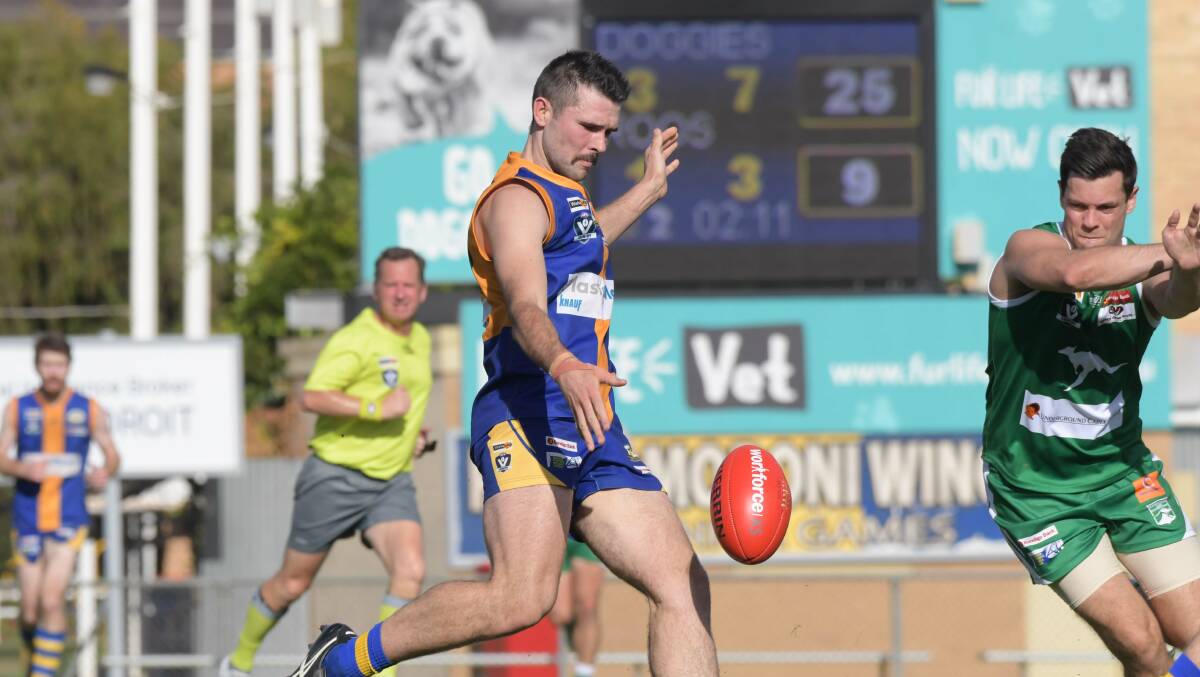 FINE GAME: Golden Square defender Jon Coe was best for the Bulldogs in their 72-point win over the Kangaroos at Wade Street. The victory extended Golden Square's winning run against Kangaroo Flat to 37 in a row and improved the Bulldogs to 2-0 this season. Picture: NONI HYETT