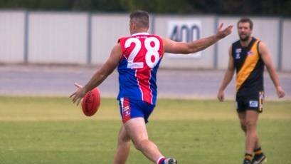 St Arnaud recruit David Hutchinson gets a kick away against Sea Lake Nandaly Tigers on Saturday. Picture: JASON SMITH