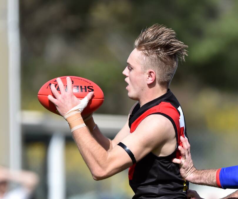 Logan Prout in action in last year's HDFNL grand final for Leitchville-Gunbower.
