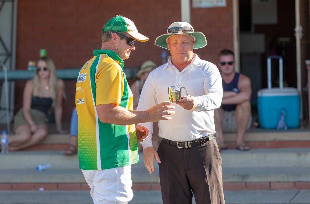 WELL PLAYED: Dingee all-rounder Scott Lawry receives his man of the match award on Saturday.