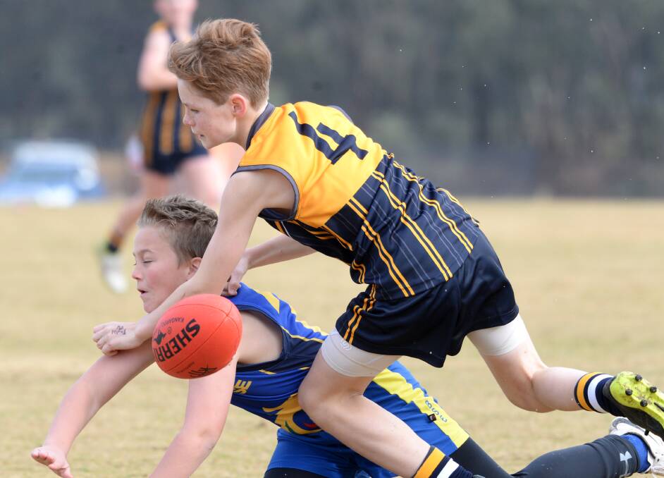TUSSLE: Catherine McAuley College defeated Bendigo South East College by 41 points in the Year 7 match on Wednesday. Picture: DARREN HOWE
