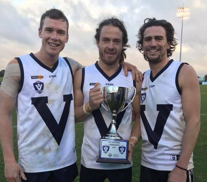 WINNERS ARE GRINNERS: Bendigo's Andrew Collins, Jack Geary and Adam Baird were all part of Victoria Country's win over Victoria Metro at Ballarat's MARS Stadium by 25 points last Sunday. Picture: JULIE BAIRD