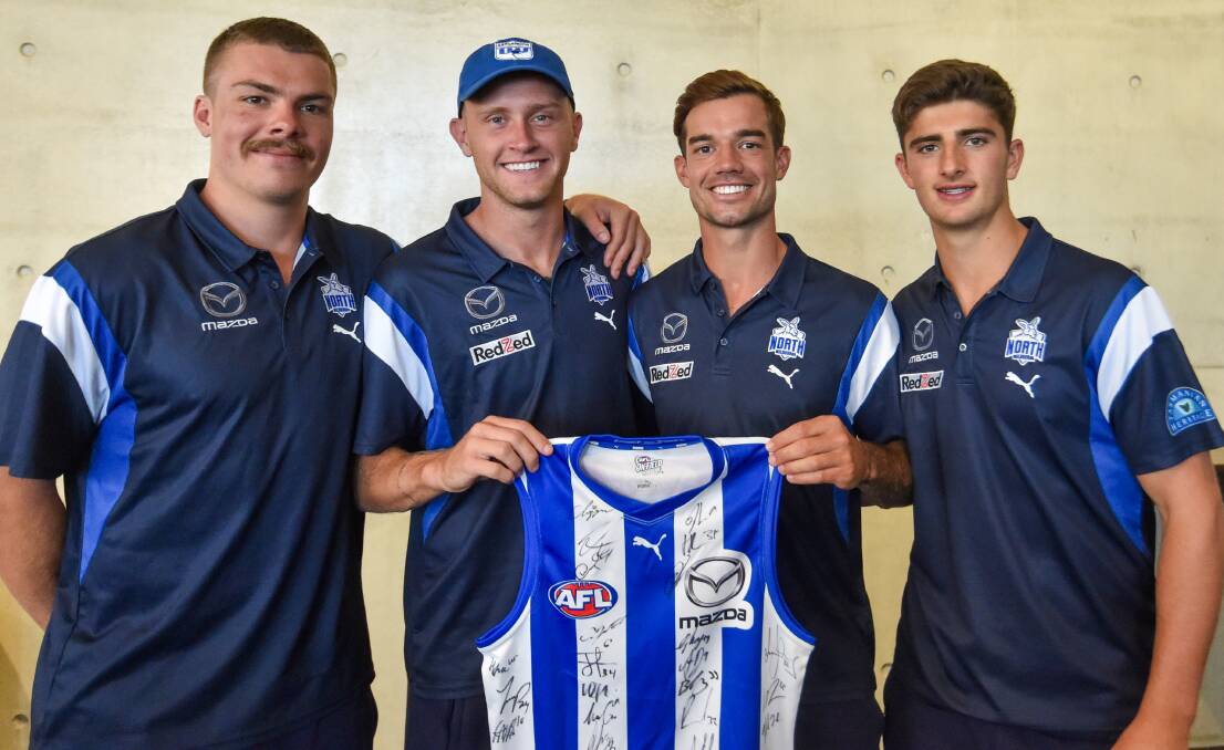 North Melbourne's Cam Zurhaar, Jaidyn Stephenson, Jy Simpkin and Harry Sheezel at Monday's civic reception. Picture by Darren Howe
