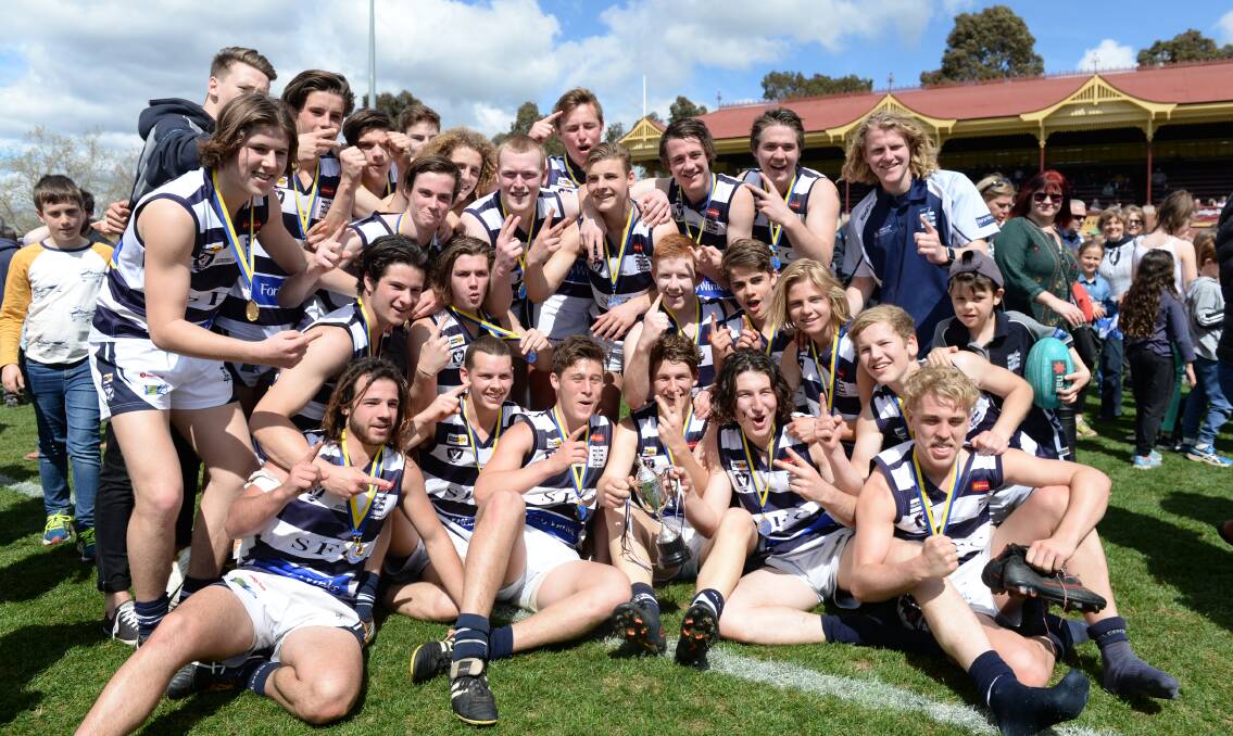 YOUNG GUNS: Strathfieldsaye's under-18 premiership team. The Storm kicked away from Sandhurst in the final quarter on Saturday to win their second flag in a row. Picture: DARREN HOWE