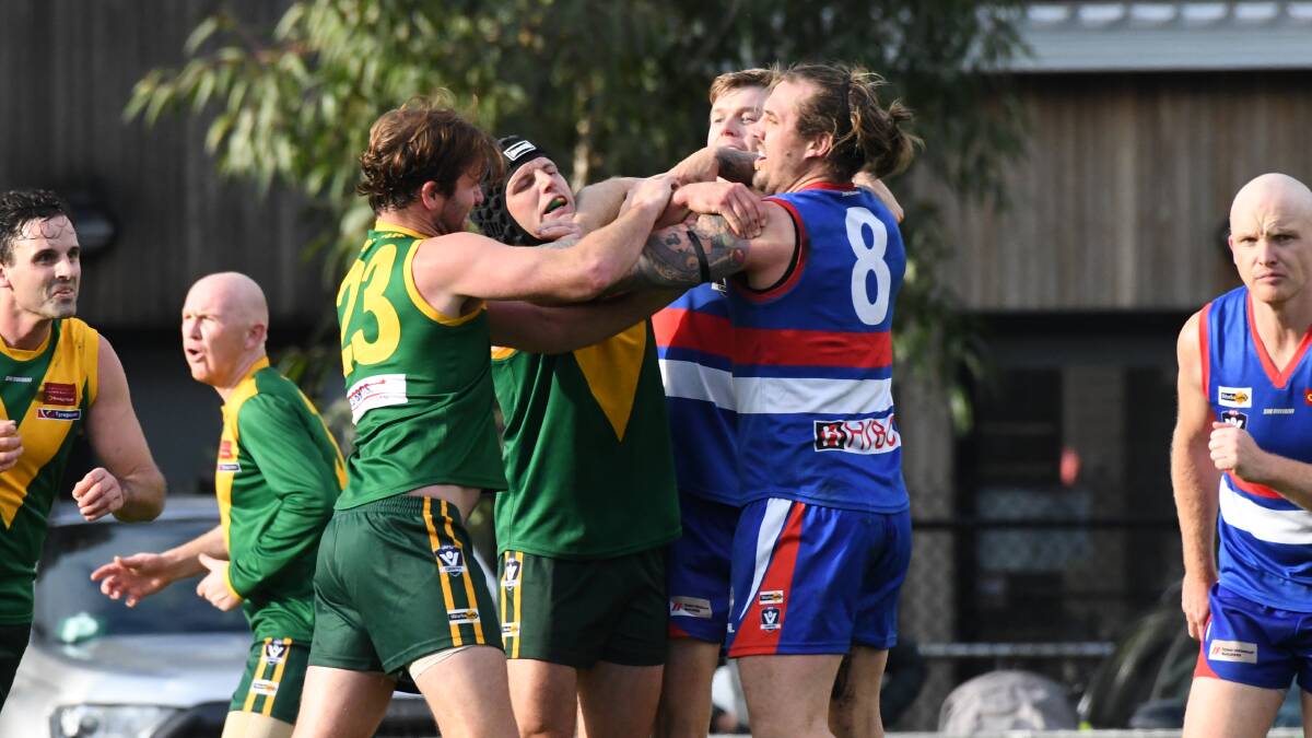 HEATED: Tempers flare between North Bendigo and Colbinabbin players during their clash at Atkins Street on Saturday. Picture: DARREN HOWE