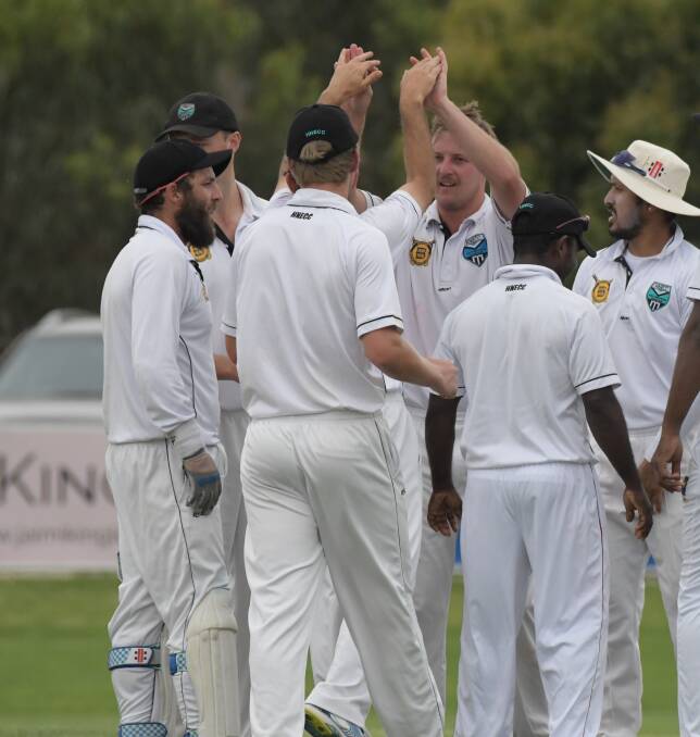 FAMILIAR SIGHT: Huntly-North Epsom's Adam Ward received plenty of high fives throughout Saturday after his eight-wicket haul against Eaglehawk.