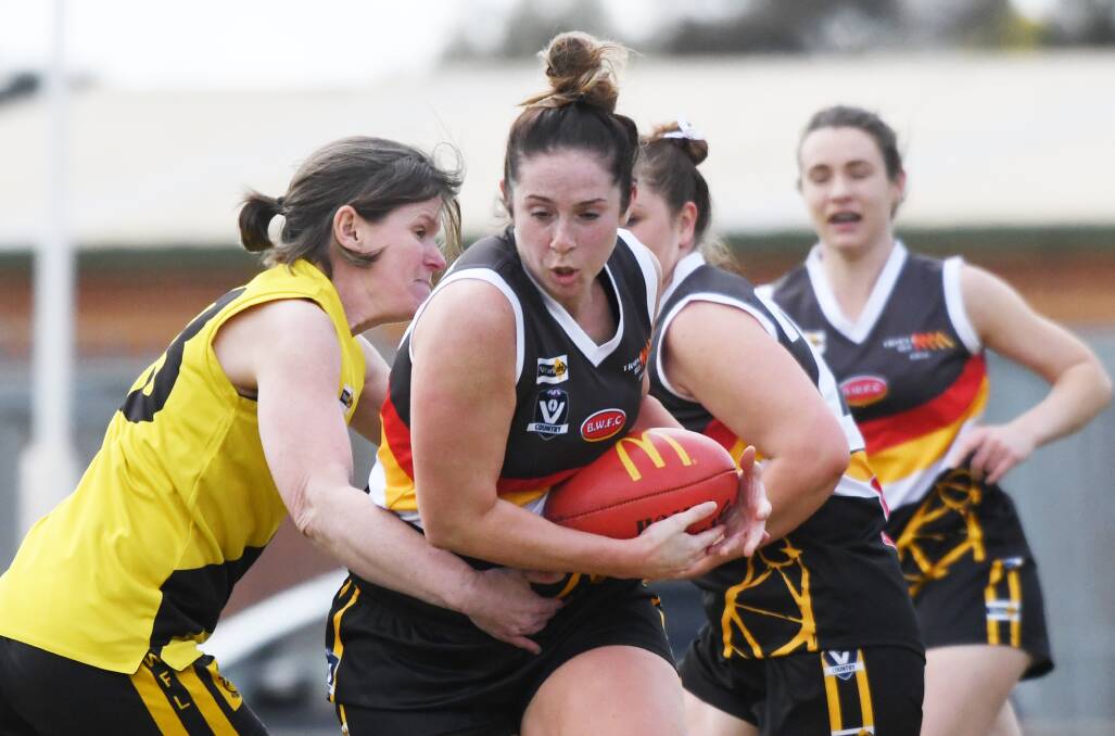 ONE-SIDED: Action from the Bendigo Thunder's 148-point victory over Kyneton in round 15 of the CVFLW at Weeroona Oval last Sunday. Picture: DARREN HOWE