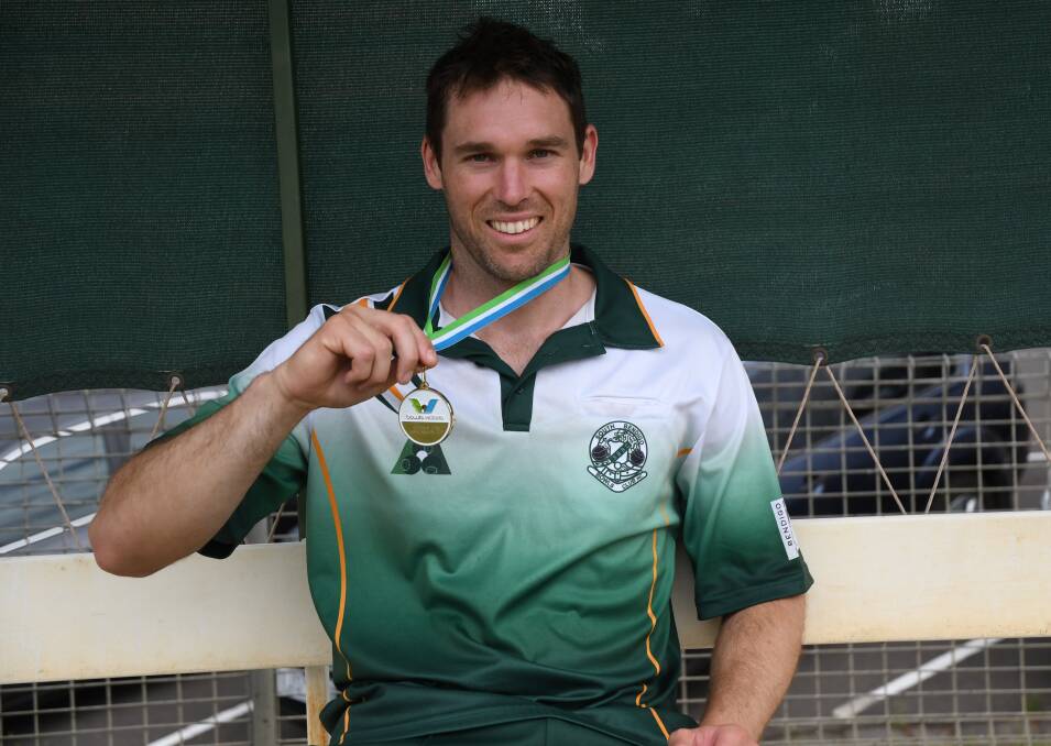 JOB WELL DONE: South Bendigo's Mitch Sidebottom with his medal for winning last year's men's singles final at the Victorian Open. Sidebottom will be back to defend his title when the Open begins on Friday in the Goulburn Valley. As well as the singles Sidebottom is also playing in the pairs and triples. Picture: LUKE WEST