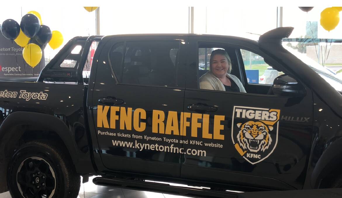 NEW WHEELS: Emily Thomson was the winner of Kyneton's Toyota Hilux raffle that has played a major role in the club whittling its $200,000 debt down to $40,000.