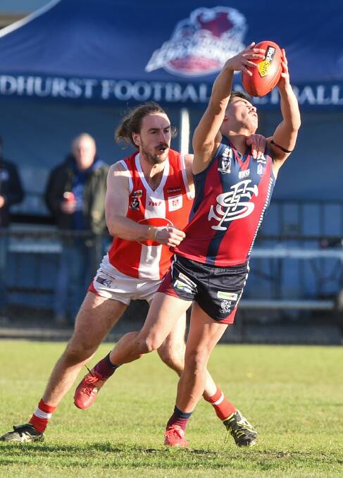 South Bendigo's Liam Byrne and Sandhurst's Jeremy Rodi both featured in their side's best players. Picture: DARREN HOWE